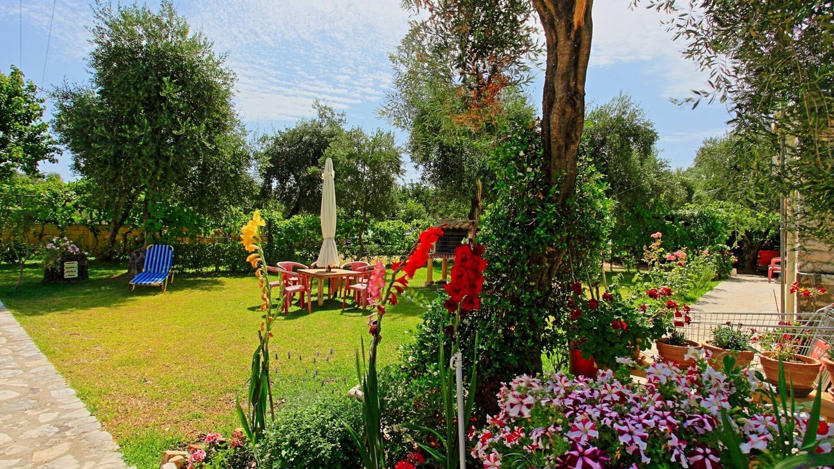 Almiros Beach Apartment | Dalia Apartment: Beautiful gardens, near beach, sleeps 4