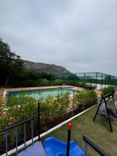 Kalwakurti Villa | Deccan Green 3BR Pvt Pool Farmhouse By Homeyhuts