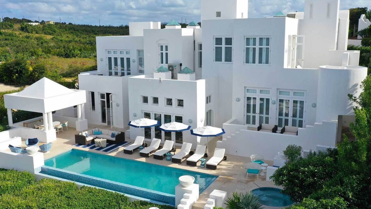 Long Bay Village Villa | Deluxe white 5 bedroom villa with sea view