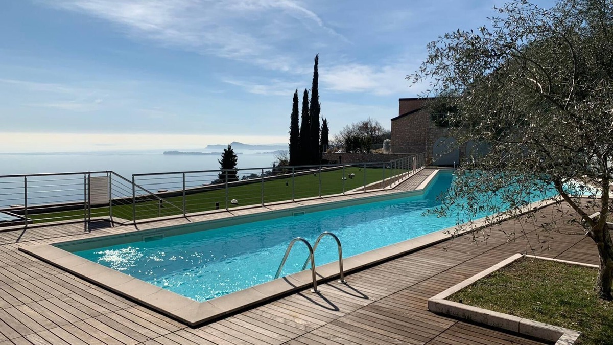 Toscolano Maderno Apartment | Design apartment - 100 sqm green terrace - Pool - Fantastic panoramic lake view