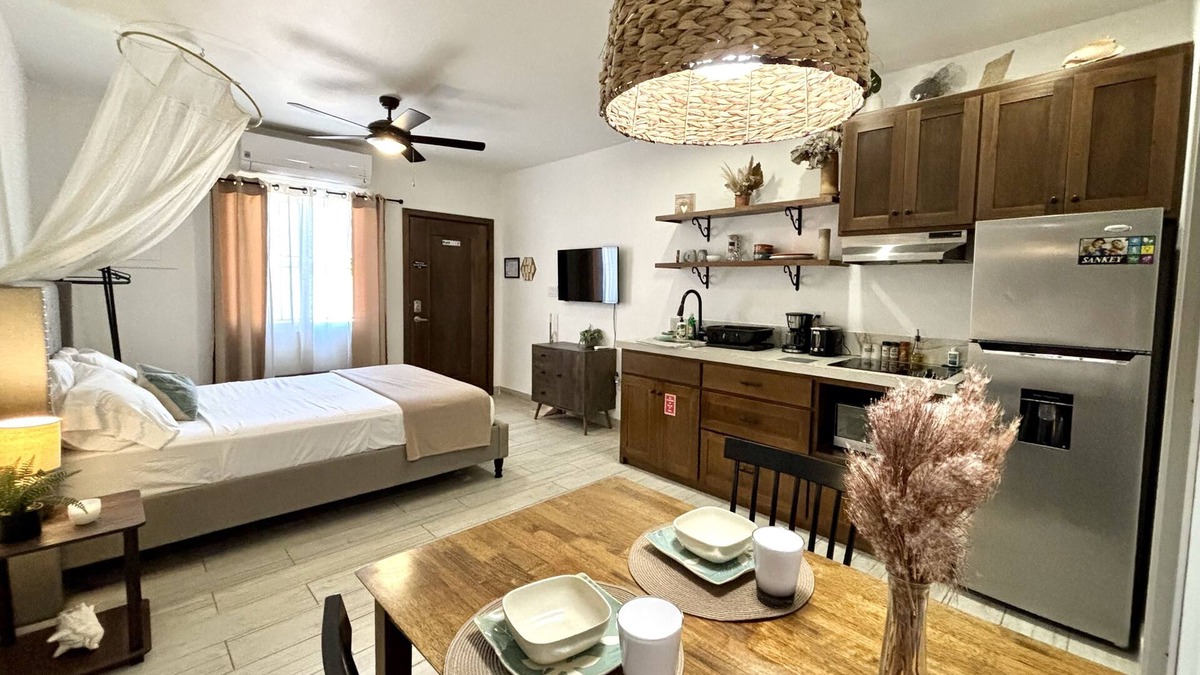 Belize City Apartment | Designer Chic Suite with Patio - Fully Stocked for Your Stay