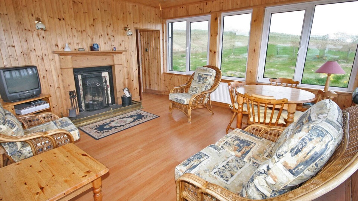 Kilmaluag Cottage | Detached croft cottage in an elevated position above Aird Bay in the spectacular north of Skye.