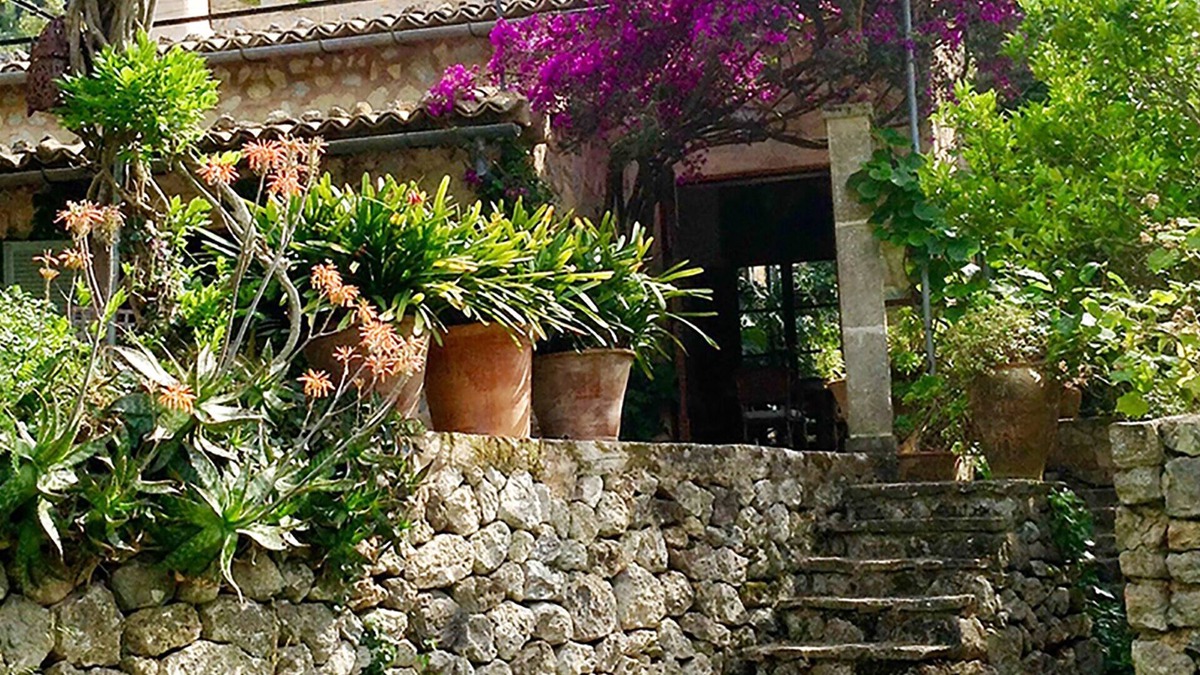 Deia House | Detached natural stone house with a beautiful garden and small pool.