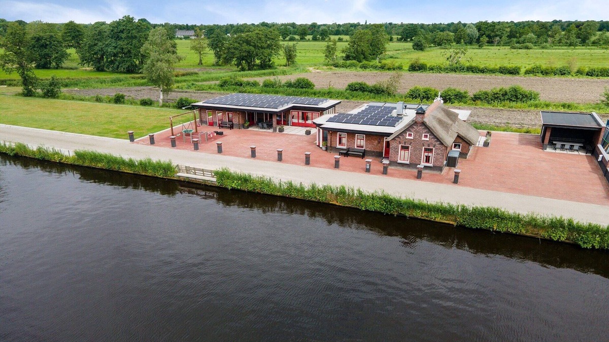 Jistrum House | Detached Home in Friesland by Canal