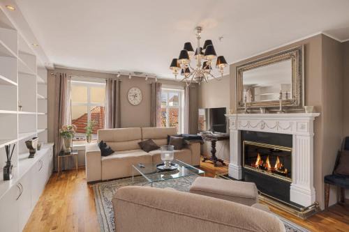 Bergen City Centre Apartment | DINBNB Apartments l 50m to Bryggen l Multiple Apts l Balcony l View l Fireplace