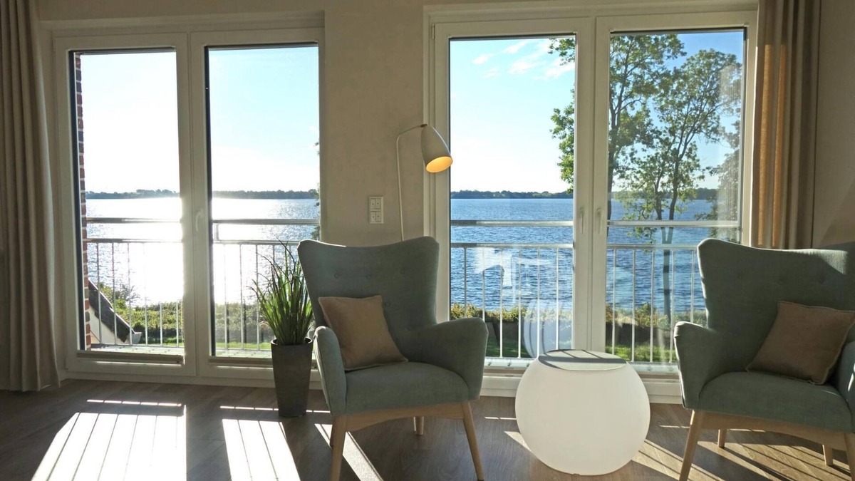 Klein Wittensee Apartment | Direct lakeside location, fantastic lake view, balcony, Baltic Sea 12 km, barrel sauna, balcony