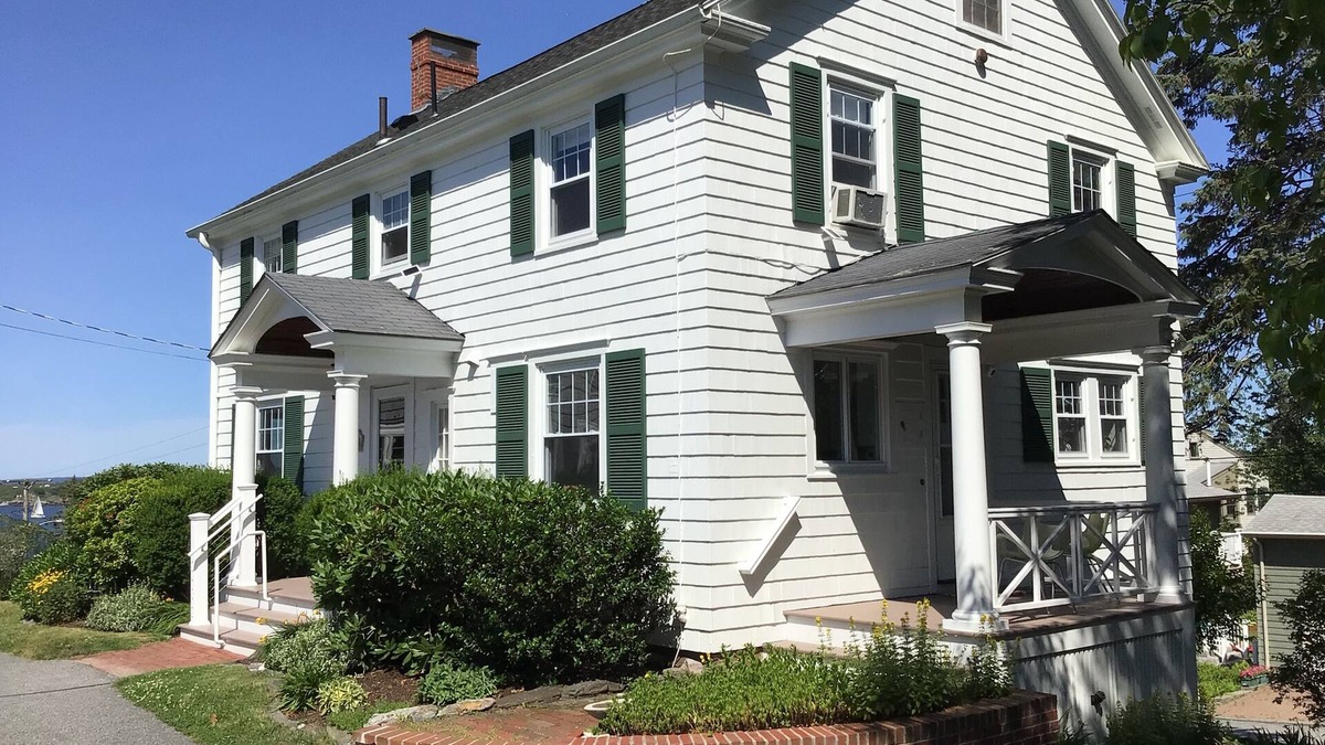 Loveitts Field House | Distinguished classic coastal home overlooks Casco Bay and Maine’s rocky shore!