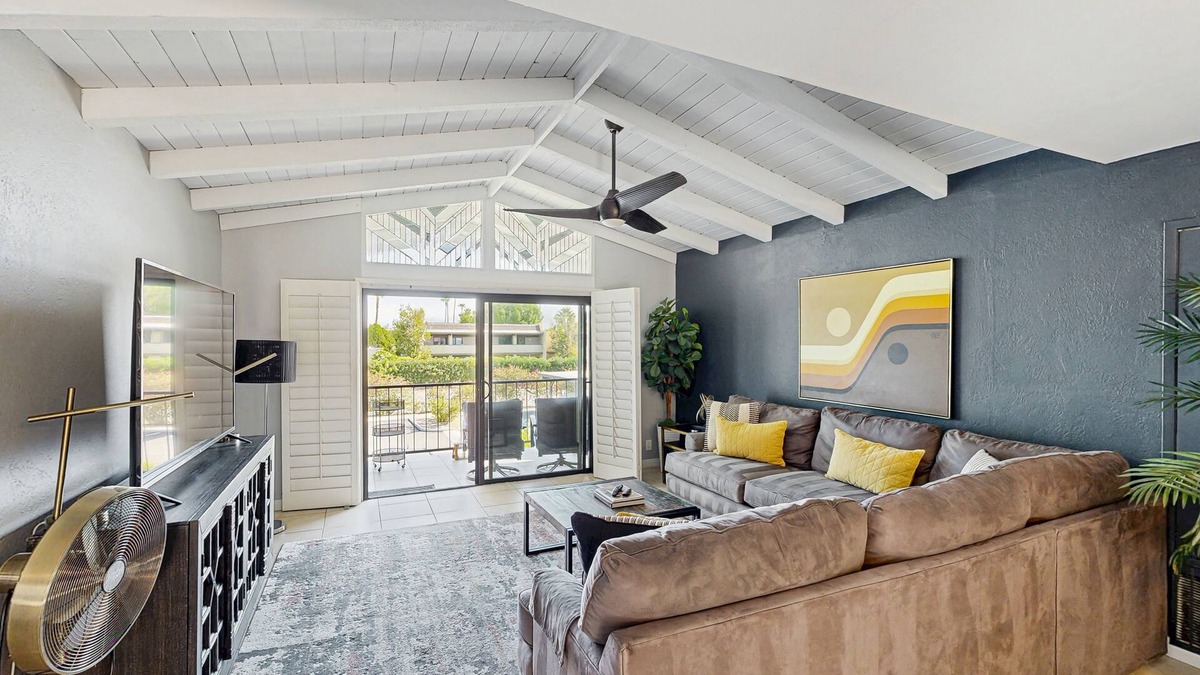 Baristo Condo | Dive into Palm Springs fun with a stylish home base featuring poolside lounging.