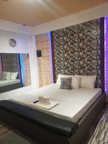 Cabanatuan Apartment | DJCI Apartelle Walk to Robinson & NE Pacific Mall 3 Min to SM Cabanatuan