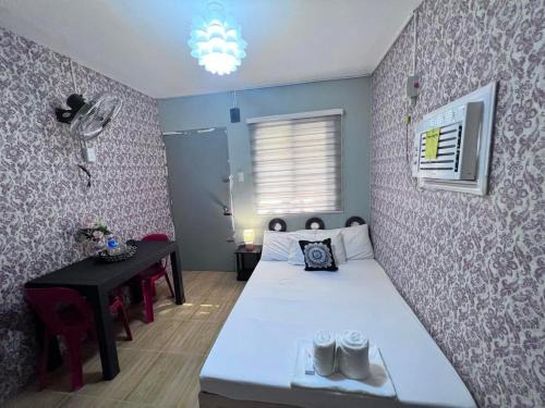 Cabanatuan Apartment | DJCI Apartelle Walk to Robinson & NE Pacific Mall 3 Min to SM Cabanatuan
