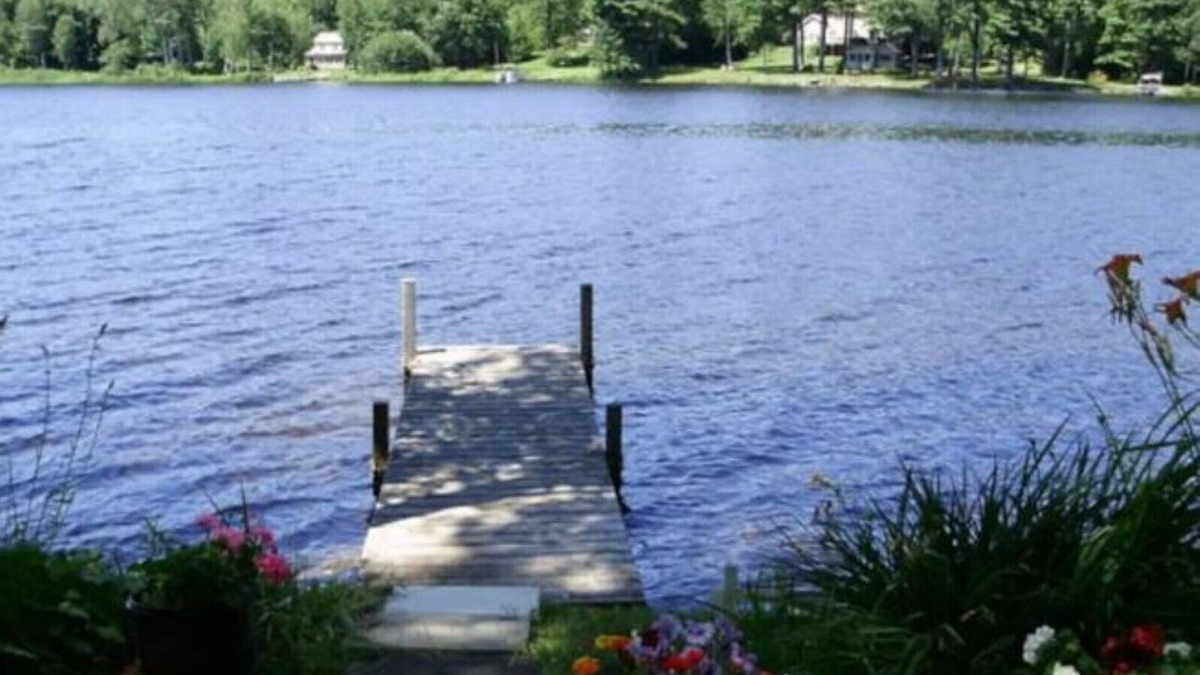 Madison House | Dock, Deck and patio on the lake.