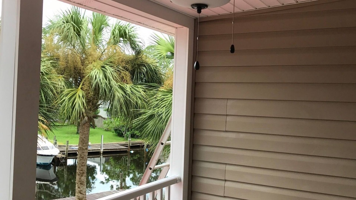 Harbour Towne House | Dock for your boat to fish the gulf! Cozy 2 bedroom townhouse in Pcb!