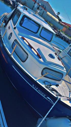Le Barcares Boat Rental | Docked boat