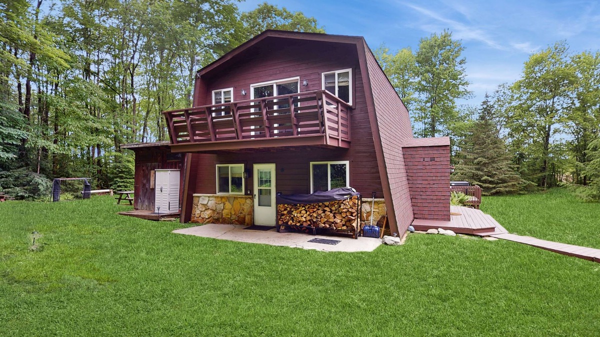 Accident House | Dog-friendly cabin with firepit, deck, private hot tub, fireplace