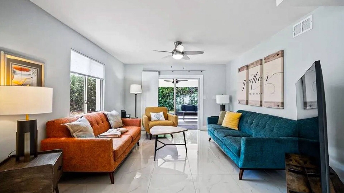 Isles of Capri Condo | Dog-friendly colorful condo with shaded patio, washer/dryer, & central AC