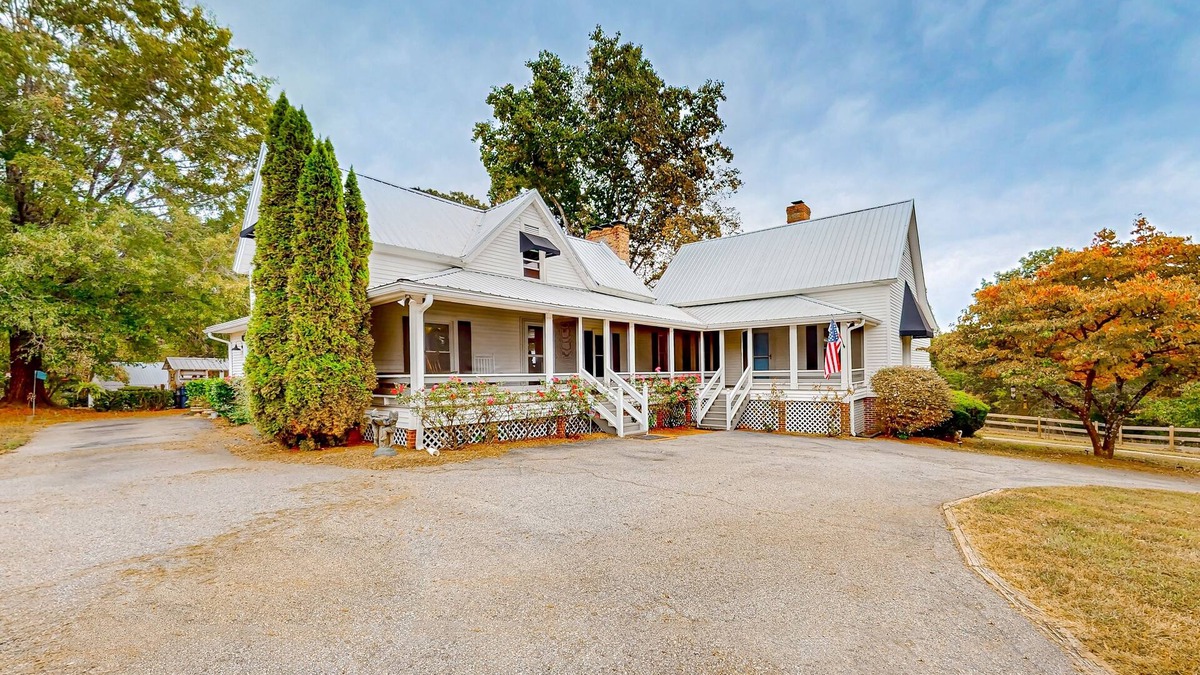 Landrum House | Dog-friendly farmhouse with hot tub, outdoor areas, & 3 fireplaces