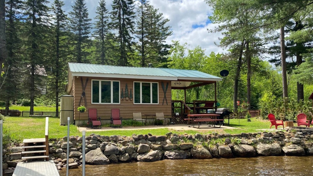 Piseco House | Dog friendly, fenced yard, sitting on the shore of Oxbow Lake