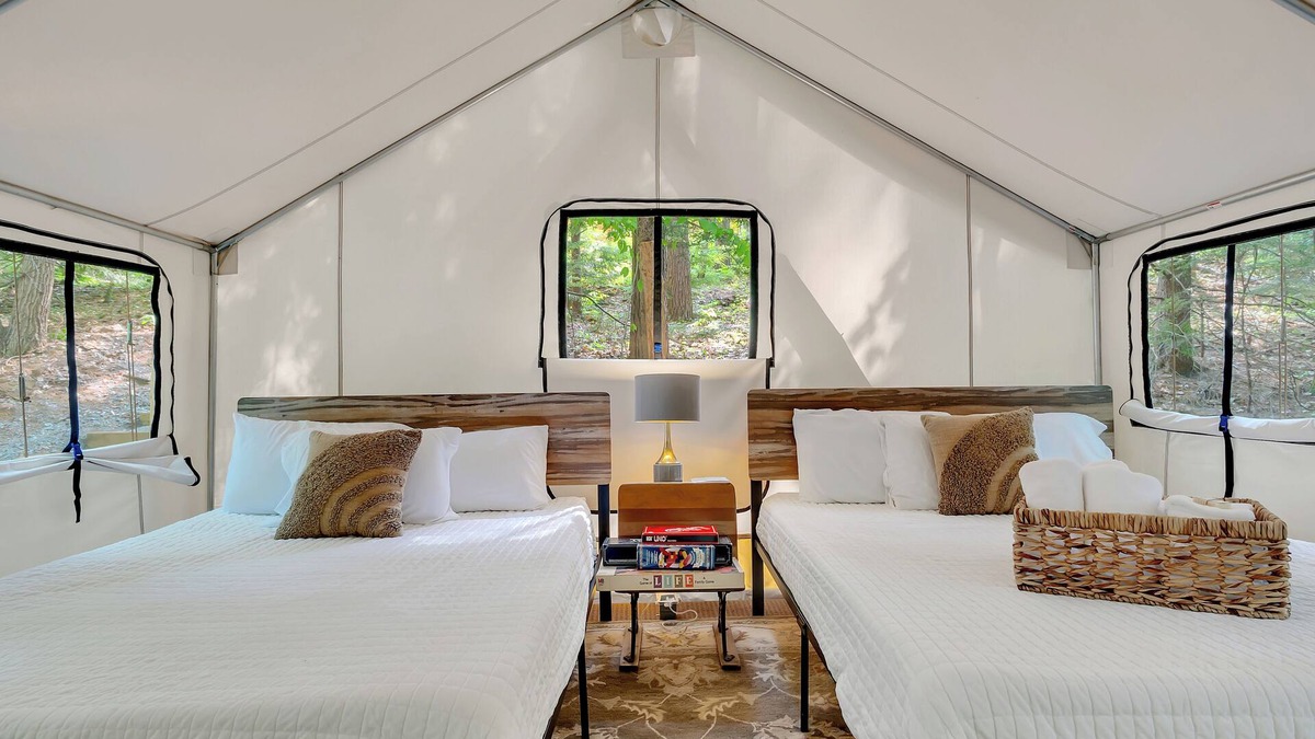 Middle Grove RV Rental | Dog-friendly glamping near Saratoga with electricity, comfy beds, and access to trails and pond.