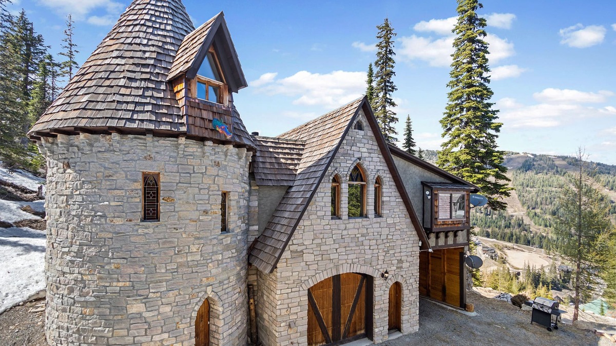 Sandpoint House | Dog-friendly mountain castle with a washer/dryer, private hot tub, & fireplace