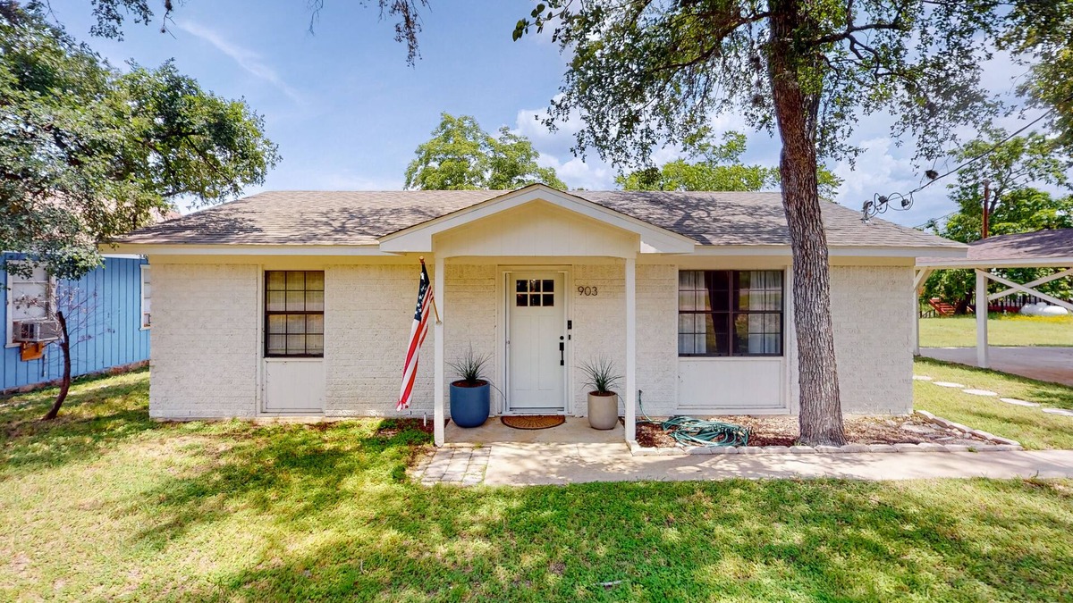 Granite Shoals House | Dog-friendly waterfront home with dock, grill, water views, patio, washer/dryer