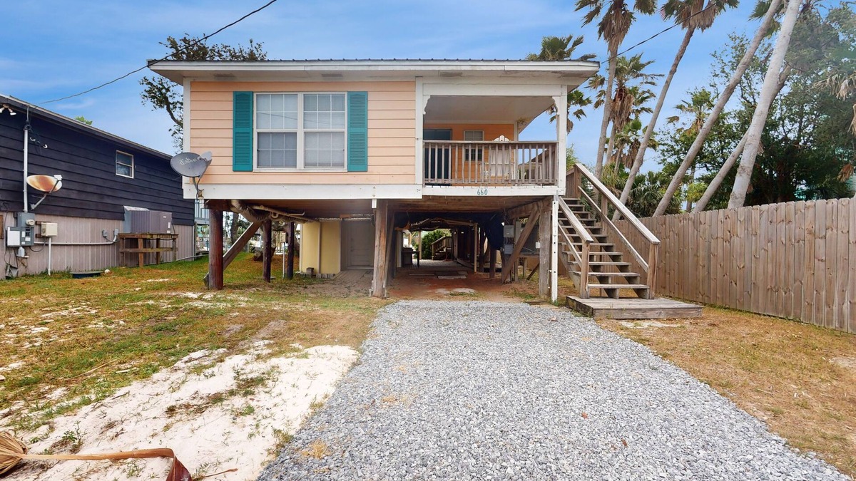 Fort Morgan Pines House | Dog-friendly waterfront retreat with a washer/dryer, AC, patio, & outdoor shower