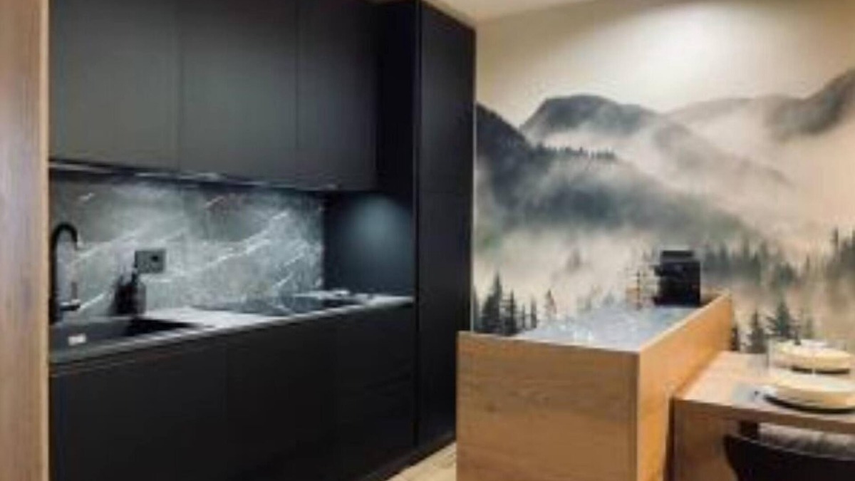 Tesero Apartment | Dolomiti Haus 300 ft from Pampeago ski lifts.