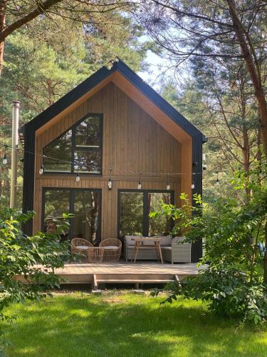 Pasym House | Dom na brzegu ciszy
