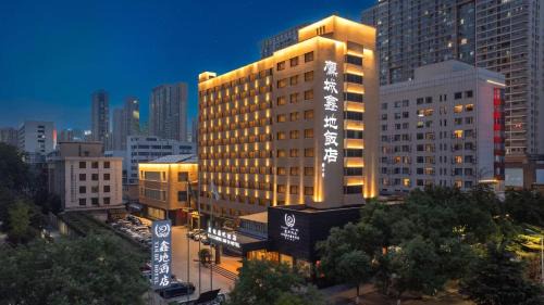 Erqi District Hotel | Eagle City Xindi Hotel