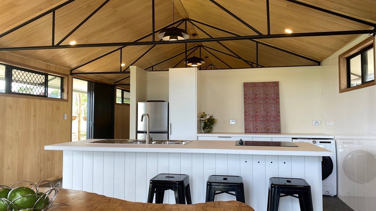 Topaz Other | Early Diggings Hut surrounded by Rainforest and verdant pasture.