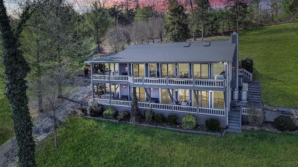 La Follette House | East Norris Point Breathtaking Lake View with Private Dock in Year Around Water