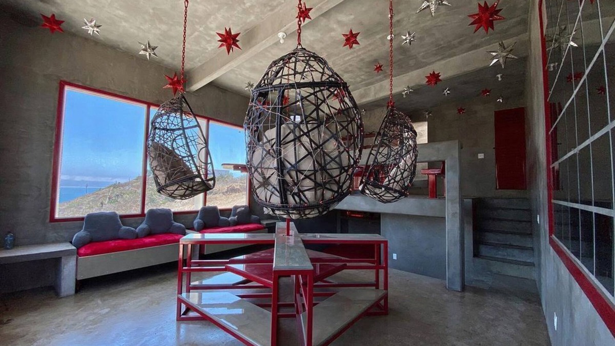Ensenada Apartment | Eclectic Cliffside Den with Hanging Living Area
