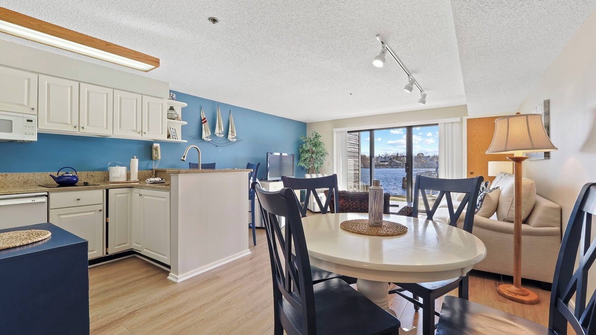 Charlevoix Condo | Edgewater Inn Condo #117D with Waterfront Access | Pool, Hot Tub, Sauna