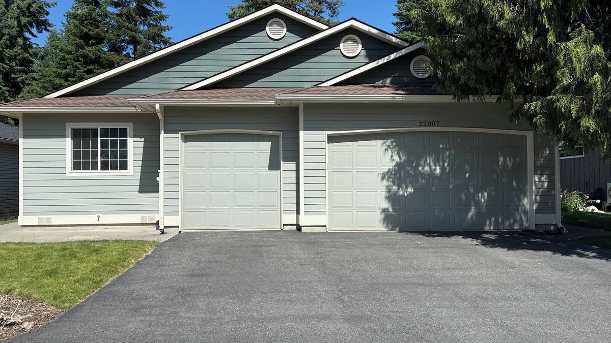 Rathdrum House | Elegant 4-bedroom Golf Course Retreat with Private Beach Access