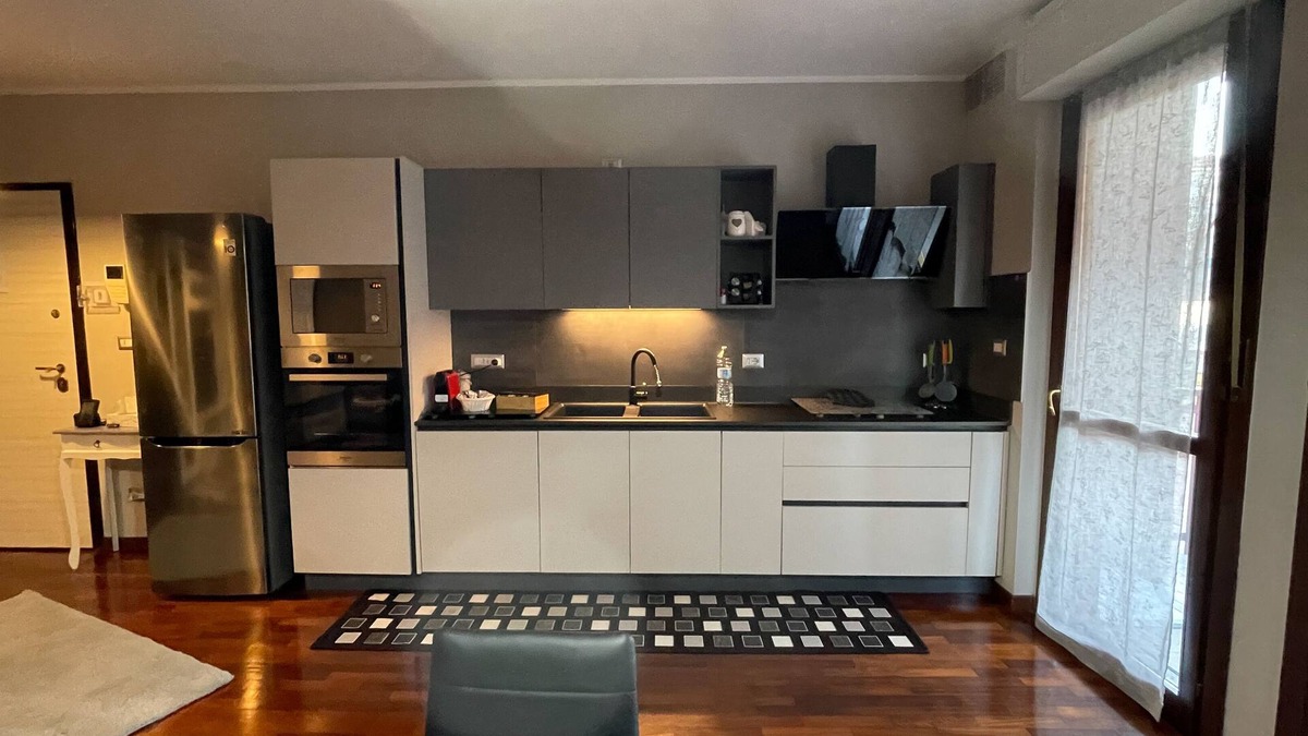 Santa Rita Apartment | Elegant apartment with private parking, a 5-minute walk from INALPI ARENA