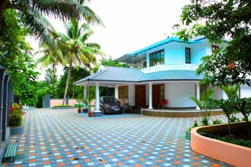 North Paravur Villa | Elegant River Front Villa Near Airport Kochi.