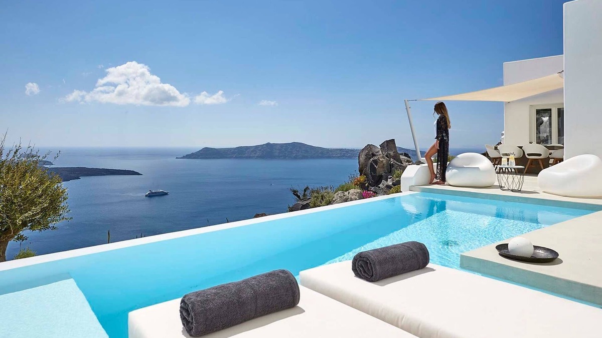 Fira Villa | Elegant Santorini Villa | Stone Pearl Villa | 2 Bedrooms | Infinity pool |.