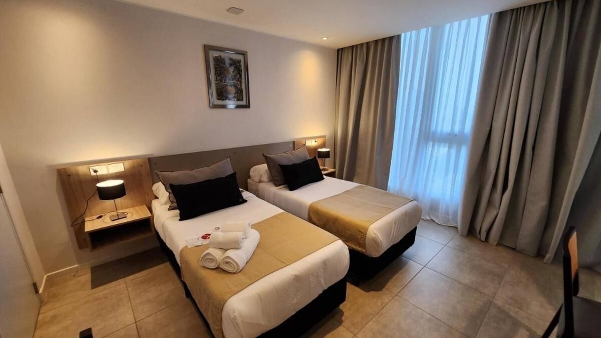 Rio Cuarto Hotel | Elegant Stay Near Plaza Estrada With Outdoor Pool Free Breakfast And Parking