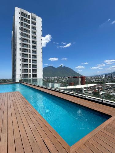 Monterrey Centro Apartment | Elegante loft apartment Paseo Santa Lucia king size bed, alberca, gym, parking, kids club