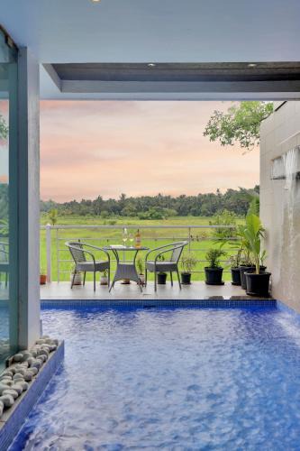 Nerul Villa | ELIVAAS 4 BHK with Pvt Pool & Sunrise or Sunset view - Risaia