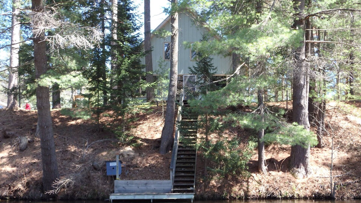 Grayling Cabin | Elysian River Escape: Autumn Bliss on the Manistee River – A Fly-Fisherman's Dream