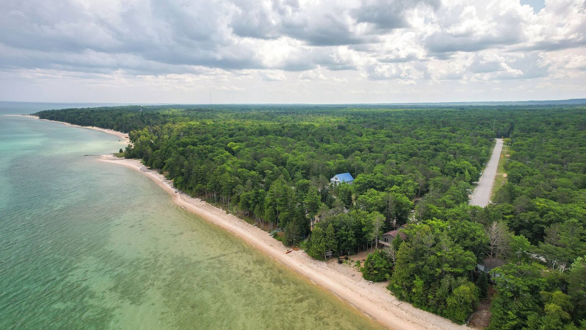Rogers City Cabin | Enchanted Lake Huron Cottage w/Beach Access!
