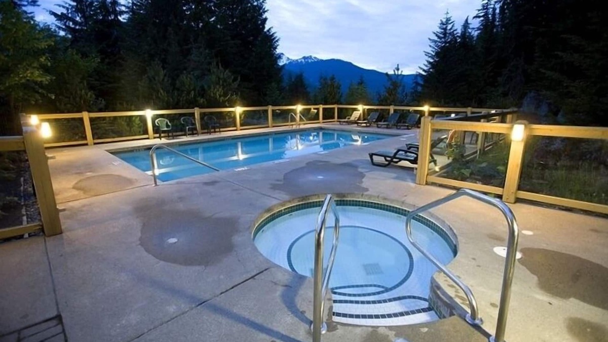 Nordic Estates Condo | Enchanting mountainside Ski In/Out french lodge style home pool hot tub