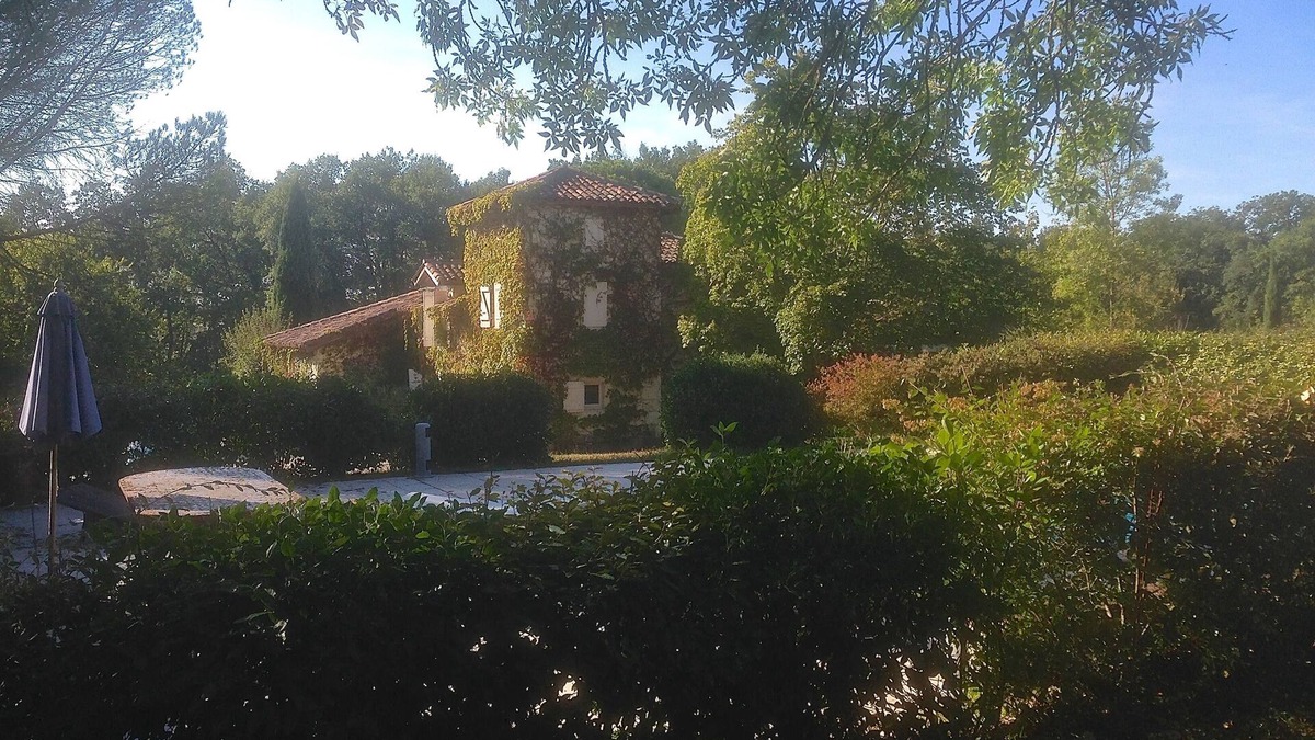 Lussan House | Enchanting stone farmhouse, pool, tennis court and several hectares of grounds.