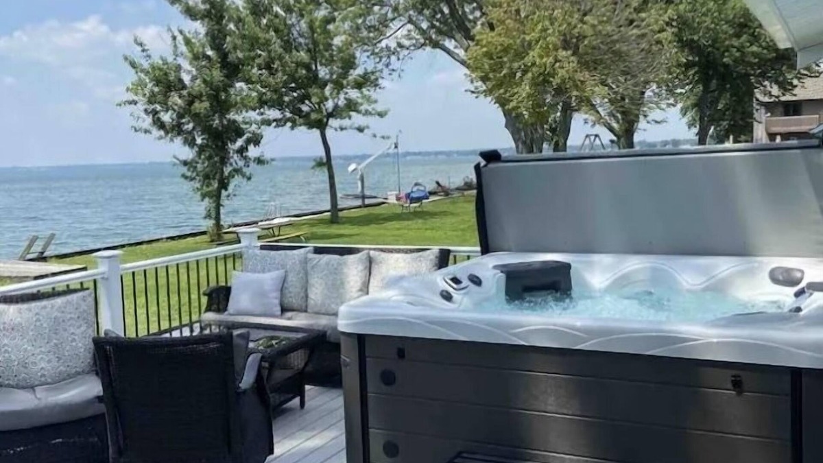 Fair Haven House | Enjoy Beautiful Sunsets at this Lake House w a HOT TUB, Boat Garage and Game Rm