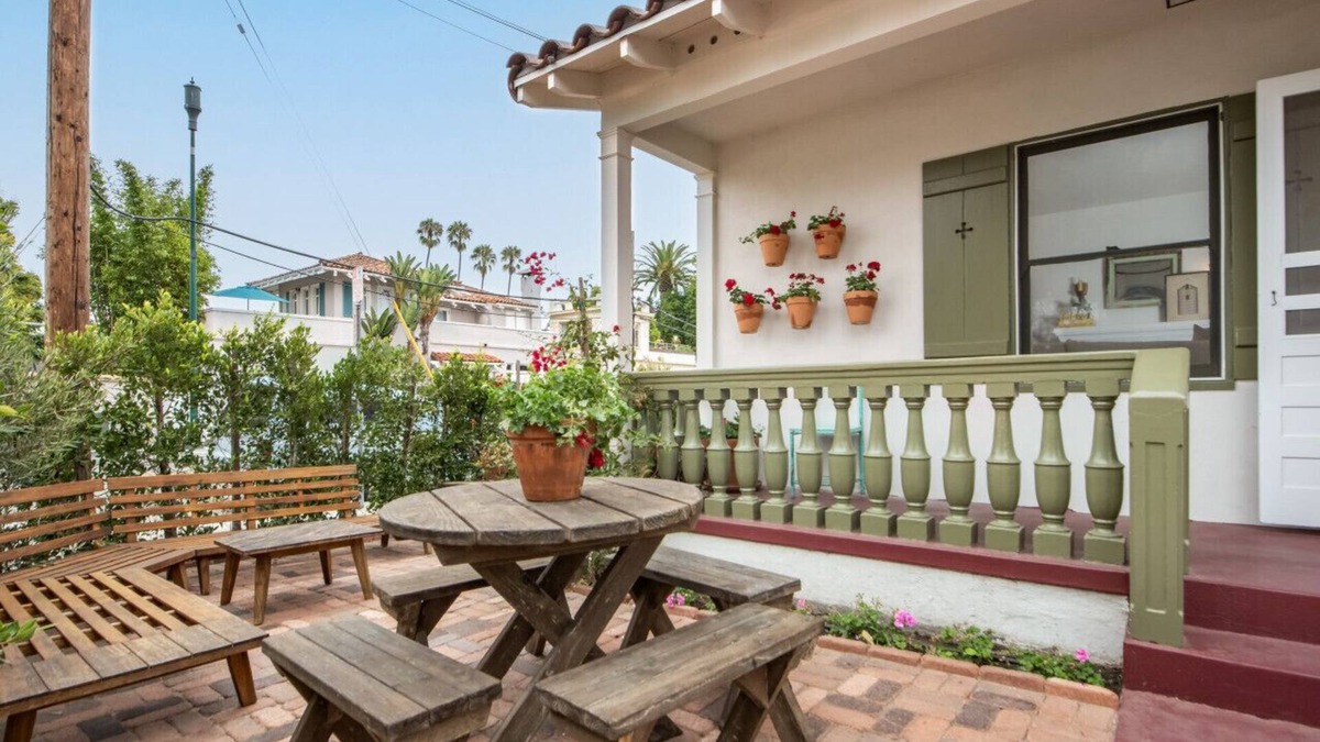 West Beach Apartment | Enjoy indoor-outdoor living, a full kitchen, and vintage coastal charm.