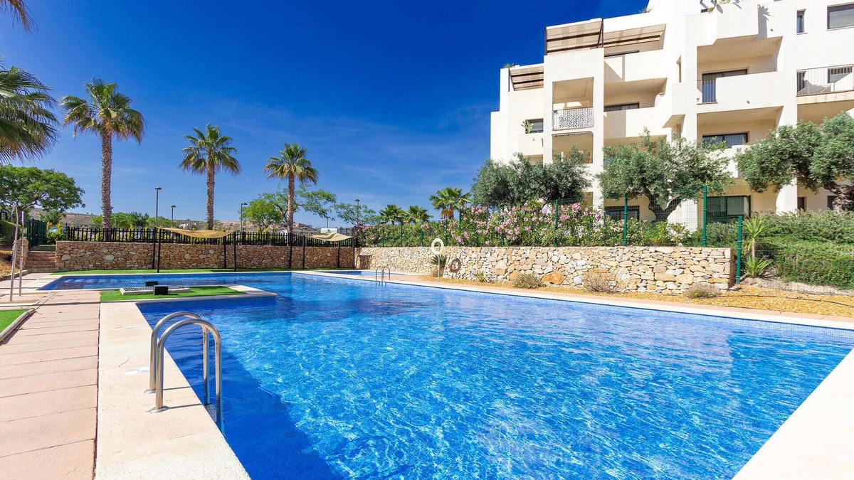 Corvera Apartment | Enjoy peace and relaxation at this golf country club with communal pool.