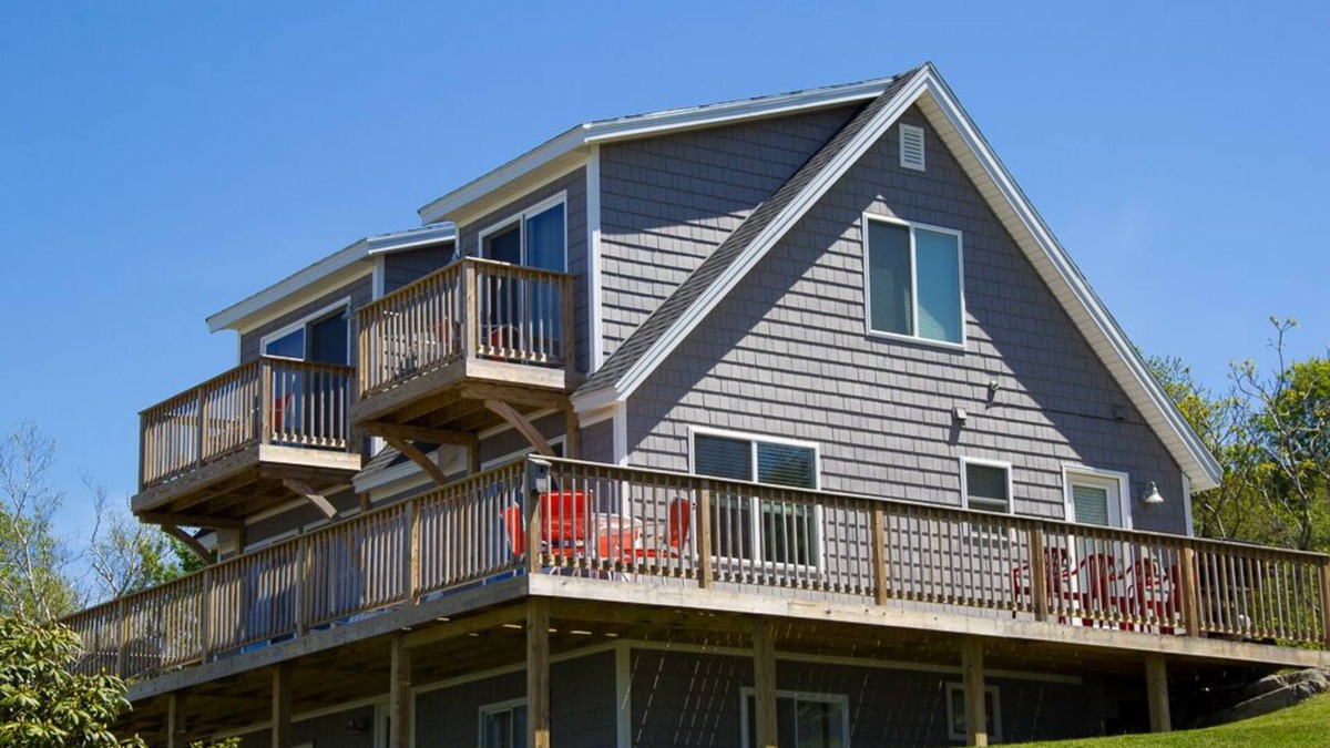 Mid-Coast and Islands House | Enjoy spectacular sunset and water views from the deck and balconies with water access.