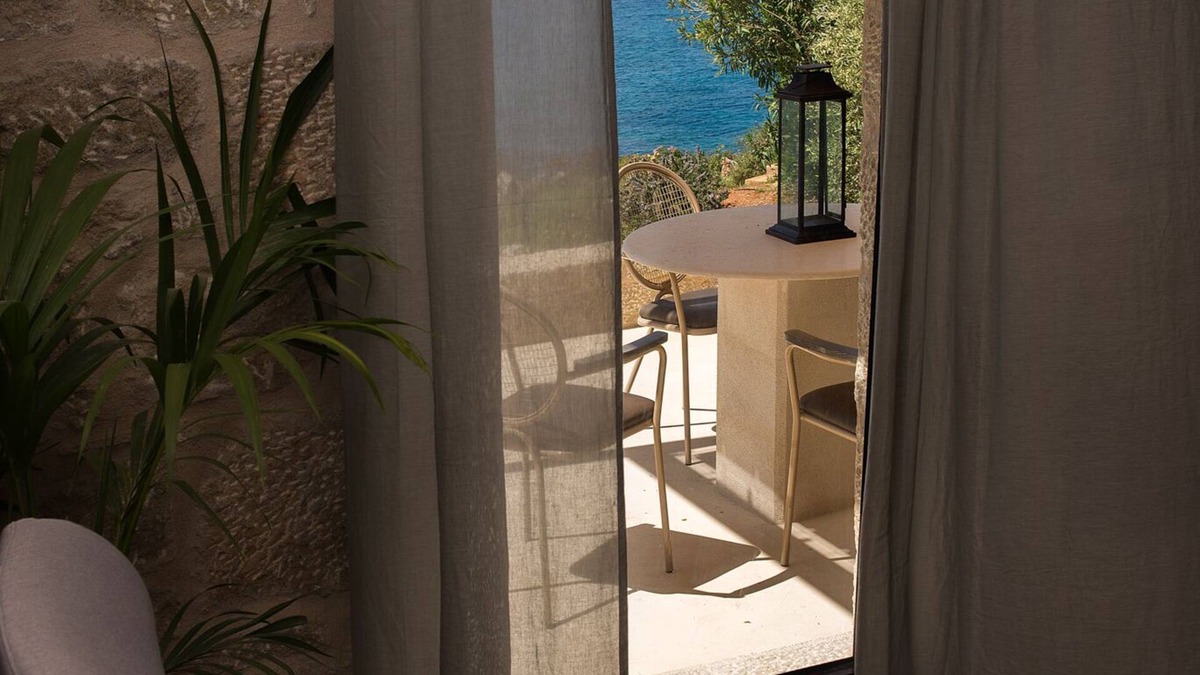Stoupa Villa | Enjoy the relaxation of chic seaside living in a sea view stone villa