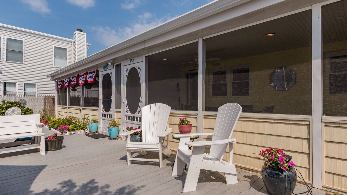 Rehoboth by the Sea Cottage | Enjoy the screened in porch just steps from the beach.
