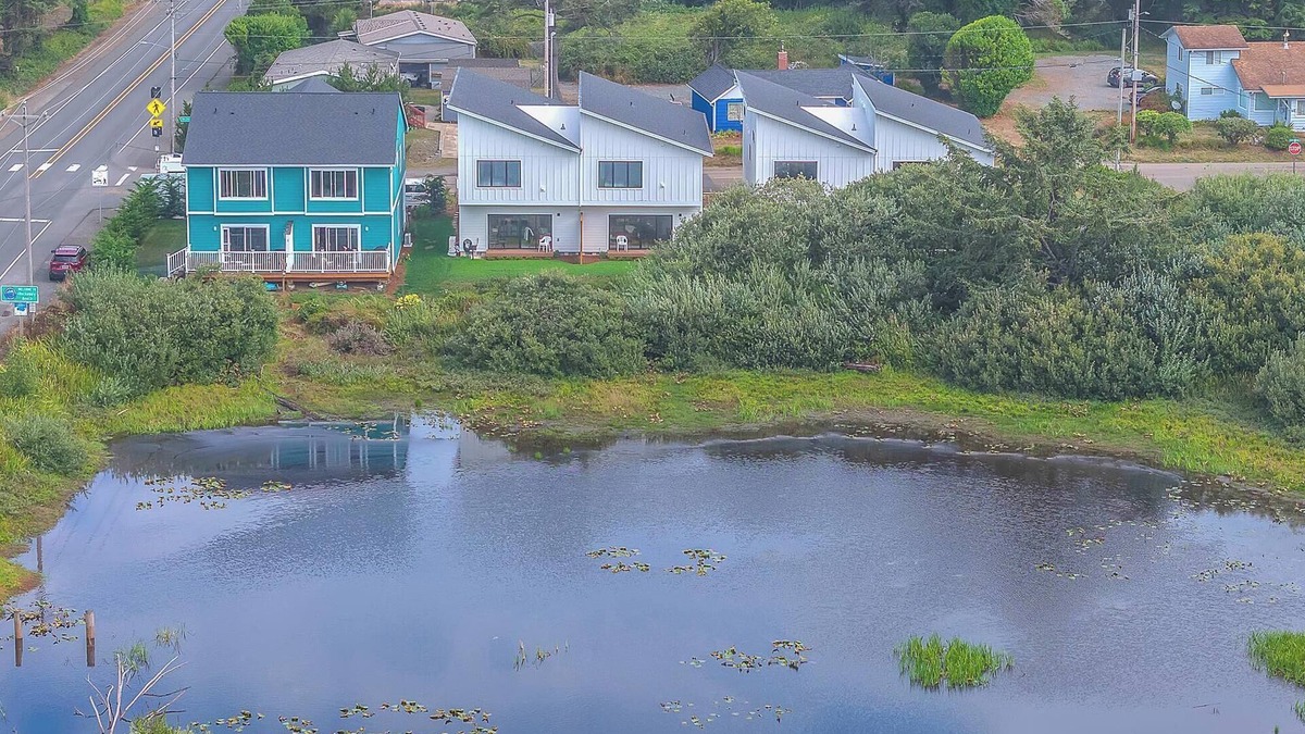 Rockaway Beach House | Escape to a cozy, modern lake house with beautiful Oregon views.